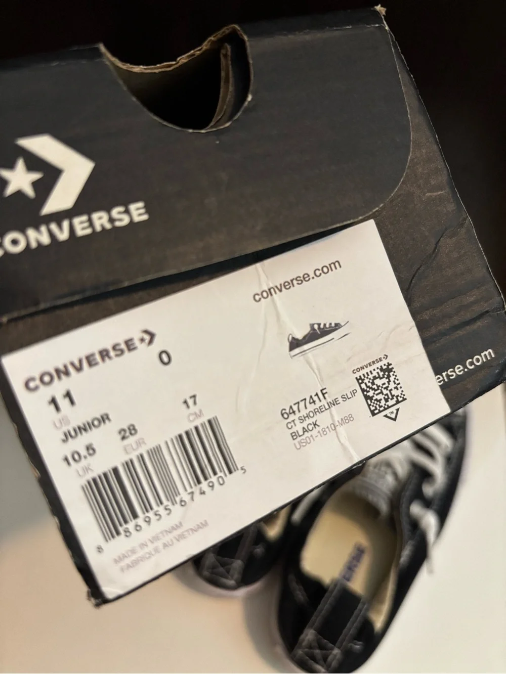 Kid’s Converse Black and White Unisex Low-Top Canvas Sneaker Pair